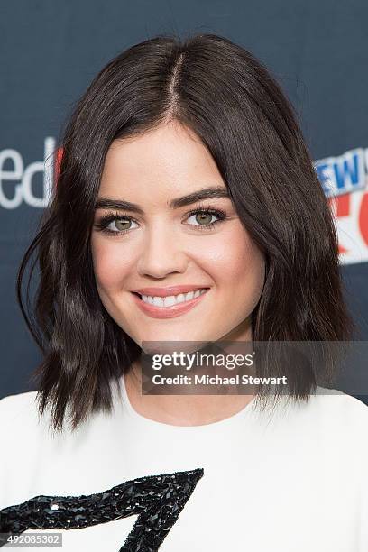 Actress Lucy Hale poses in the press room for the "Pretty Little Liars" panel during New York Comic-Con Day 2 at The Jacob K. Javits Convention...