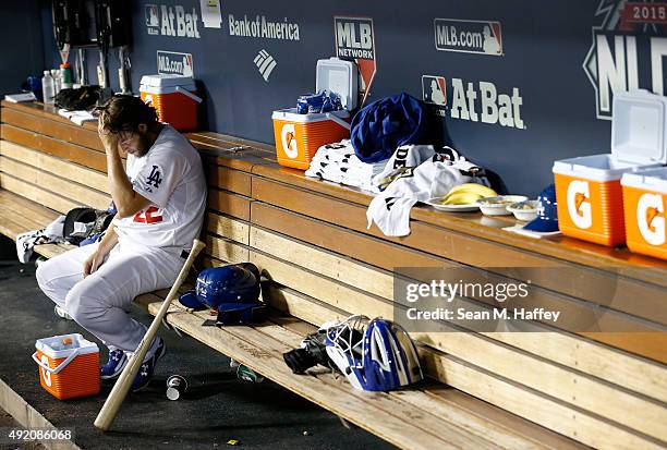 Clayton Kershaw of the Los Angeles Dodgers reacts in the dugout after being taken out of the game in the seventh inning against the New York Mets in...