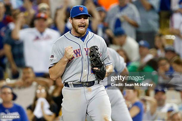 Daniel Murphy of the New York Mets celebrates after the final out in the Mets 3-1 win against the Los Angeles Dodgers in game one of the National...