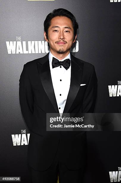 Steven Yeun attends AMC's "The Walking Dead" Season 6 Fan Premiere Event 2015 at Madison Square Garden on October 9, 2015 in New York City.