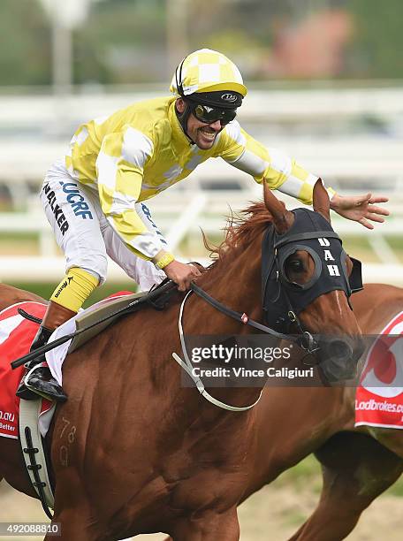 Michael Walker riding Criterion reacts after defeating Happy Trails and Opie Bosson riding Mongolian Khan in Race 6, the Ladbrokes Caulfield Stakes...