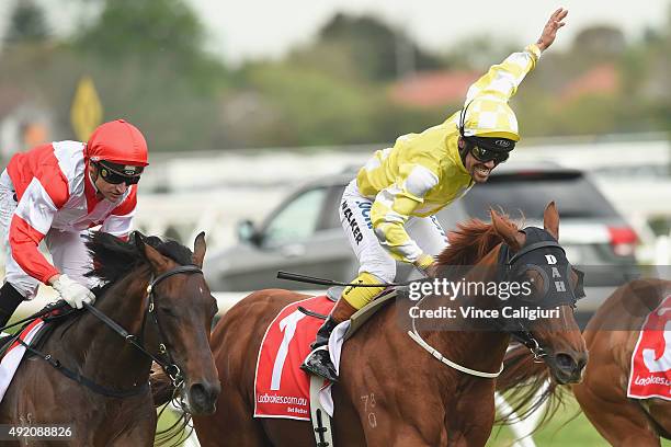 Michael Walker riding Criterion reacts after defeating Happy Trails and Opie Bosson riding Mongolian Khan in Race 6, the Ladbrokes Caulfield Stakes...