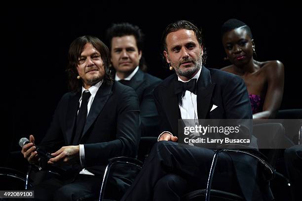 Norman Reedus, Danai Gurira and Andrew Lincoln onstage at AMC's "The Walking Dead" Season 6 Fan Premiere Event 2015 at Madison Square Garden on...