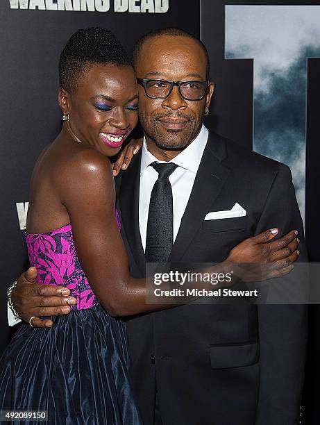 Actors Danai Gurira and Lennie James attend "The Walking Dead" season six premiere at Madison Square Garden on October 9, 2015 in New York City.