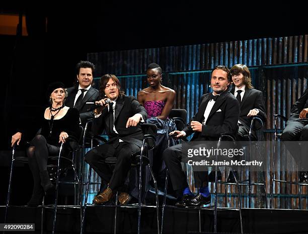 Melissa McBride, Josh McDermitt, Norman Reedus, Danai Gurira, Andrew Lincoln, Chandler Riggs and Seth Gilliam speak onstage at AMC's "The Walking...