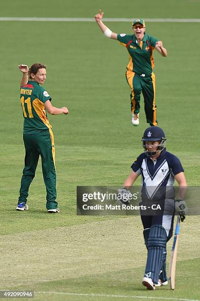 Julie Hunter of the Roar celebrates a wicket during the round one WNCL match between Victoria and Tasmania at Allan Border Field on October 10, 2015...