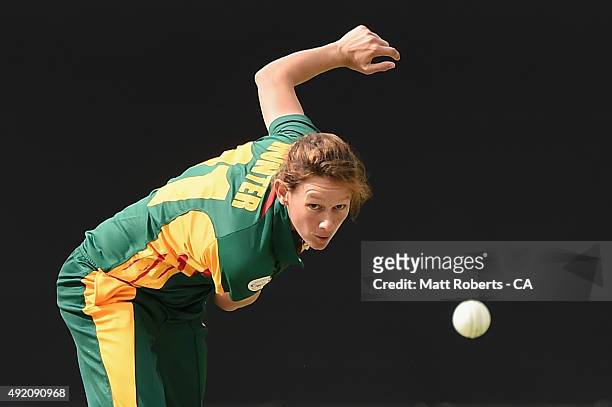 Julie Hunter of the Roar bowls during the round one WNCL match between Victoria and Tasmania at Allan Border Field on October 10, 2015 in Brisbane,...
