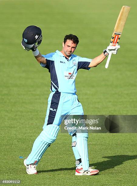 Ed Cowan of the Blues celebrates his century during the Matador BBQs One Day Cup match between New South Wales and Western Australia at Blacktown...