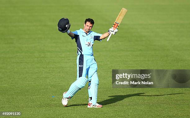 Ed Cowan of the Blues celebrates his century during the Matador BBQs One Day Cup match between New South Wales and Western Australia at Blacktown...