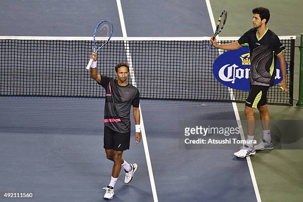 Raven Klaasen of South Africa and Marcelo Melo of Brazil celebrate after winning the men's doubles semi final match against Aisam-Ul-Haq Qureshi of...