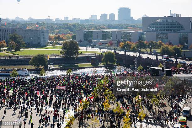 Protesters gather to demonstrate against the TTIP and CETA trade accords on October 10, 2015 in Berlin, Germany. Tens of thousands took to the...