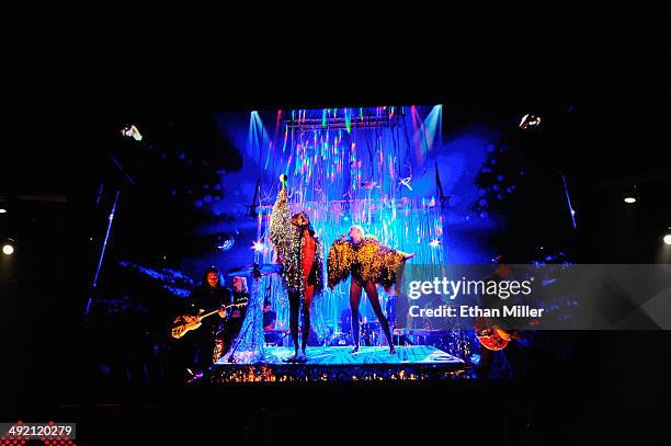 Singer Wayne Coyne of The Flaming Lips and singer Miley Cyrus perform via satellite during the 2014 Billboard Music Awards at the MGM Grand Garden...