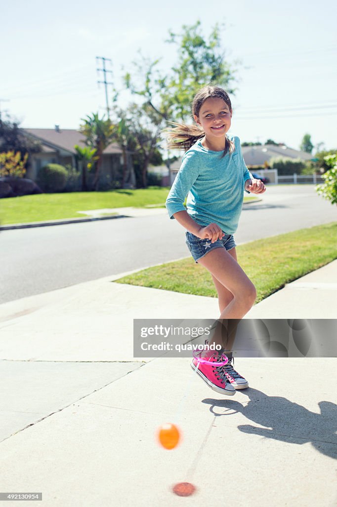 Using A Skip It Girl Playing With A Skip It High-Res Stock Photo - Getty Images