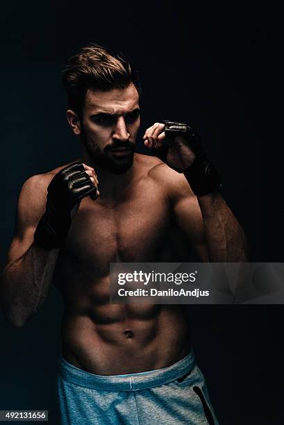 always ready for the fight - belly punching stock pictures, royalty-free photos & images