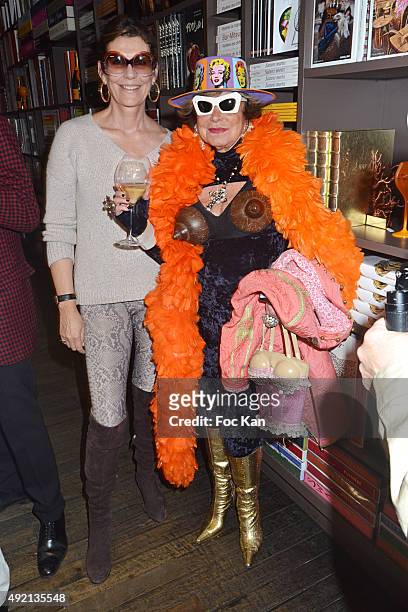 Martine Assouline and Yanou Collart attend the 'Le Caca's Club' Book Launch Cocktail at Librairie Assouline on October 9, 2015 in Paris, France.
