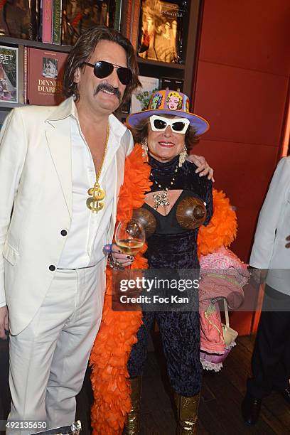 Frederic Beigbeder and PR Yanou Collart attend 'Le Caca's Club' Book Launch Cocktail at Librairie Assouline on October 9, 2015 in Paris,