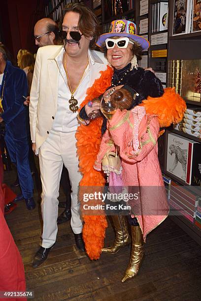 Frederic Beigbeder and PR Yanou Collart attend 'Le Caca's Club' Book Launch Cocktail at Librairie Assouline on October 9, 2015 in Paris, France.