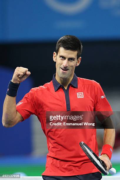 Novak Djokovic of Serbia reacts during the Men's single semi-final match against David Ferrer of Spain on day 8 of the 2015 China Open at the China...
