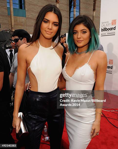 Models Kendall Jenner and Kylie Jenner attend the 2014 Billboard Music Awards at the MGM Grand Garden Arena on May 18, 2014 in Las Vegas, Nevada.