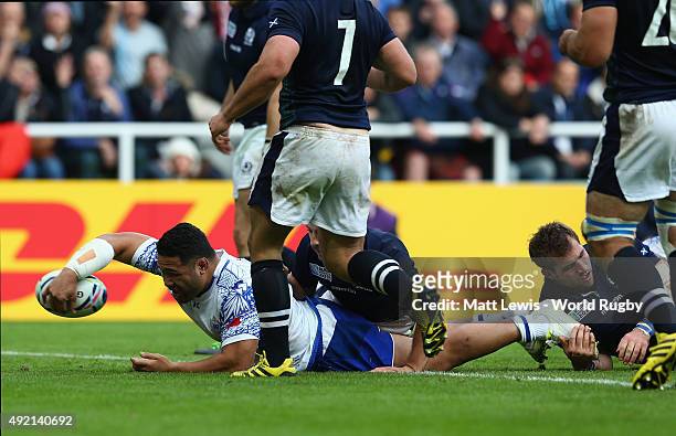 Motu Matu'u of Samoa scores the fourth try during the 2015 Rugby World Cup Pool B match between Samoa and Scotland at St James' Park on October 10,...