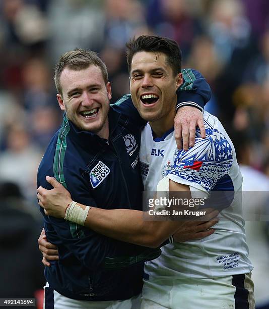 Stuart Hogg and Sean Maitland of Scotland celebrate after the 2015 Rugby World Cup Pool B match between Samoa and Scotland at St James' Park on...