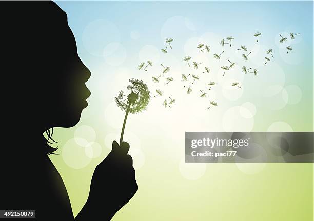 young girl blow dandelion - imagination kids stock illustrations