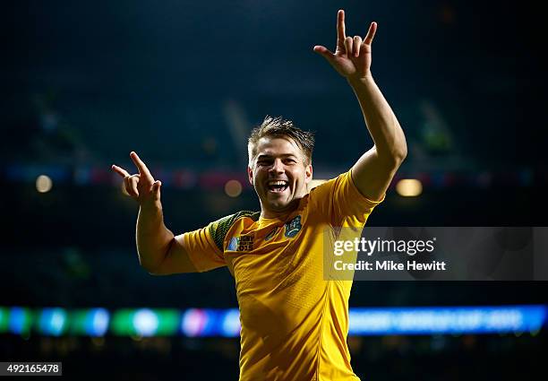 Drew Mitchell of Australia celebrates victory after the 2015 Rugby World Cup Pool A match between Australia and Wales at Twickenham Stadium on...