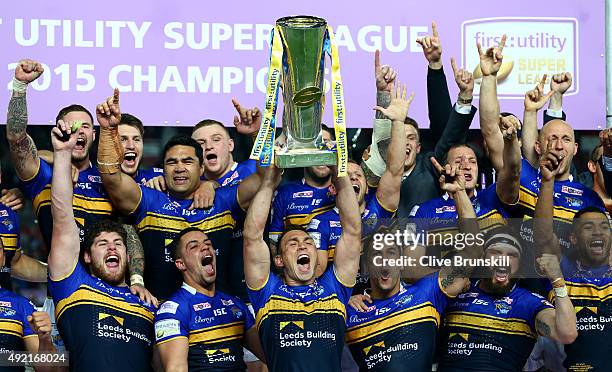 Kevin Sinfield of the Leeds Rhinos celebrates as he holds the trophy aloft with his team mates after the First Utility Super League Grand Final...