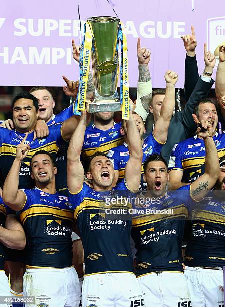 Kevin Sinfield of the Leeds Rhinos celebrates as he holds the trophy aloft with his team mates after the First Utility Super League Grand Final...