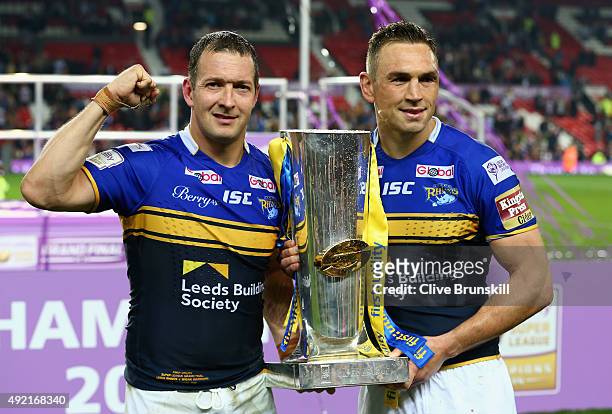 Kevin Sinfield captain of the Leeds Rhinos celebrates as he holds the trophy with his team mate and man of the match Danny McGuire after the First...