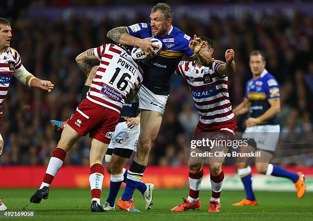 Jamie Peacock of the Leeds Rhinos is tackled during the First Utility Super League Grand Final between Wigan Warriors and Leeds Rhinos at Old...
