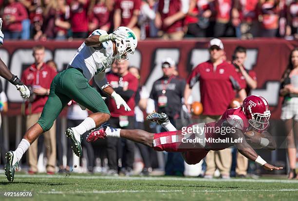 Ryquell Armstead of the Temple Owls scores a touchdown past Jarrod Franklin of the Tulane Green Wave on October 10, 2015 at Lincoln Financial field...