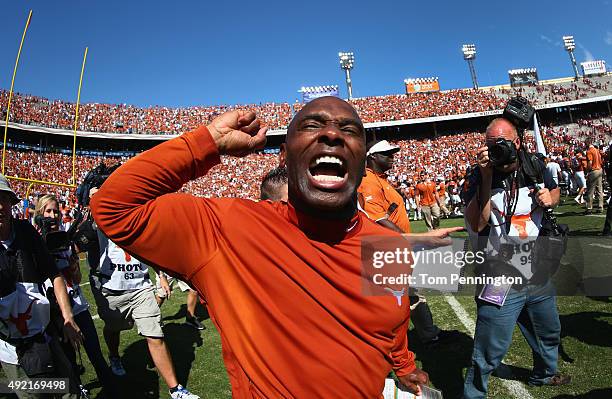 Head coach Charlie Strong of the Texas Longhorns celebrates after the Longhorns beat the Oklahoma Sooners 24-17 during the AT&T Red River Showdown at...