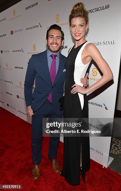 Former MMA fighter Kenny Florian and guest arrive on the red carpet at the 2014 Sports Spectacular Gala at the Hyatt Regency Century Plaza on May 18,...