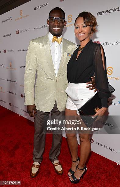 Professional football player Ricardo Lockette and guest arrive on the red carpet at the 2014 Sports Spectacular Gala at the Hyatt Regency Century...