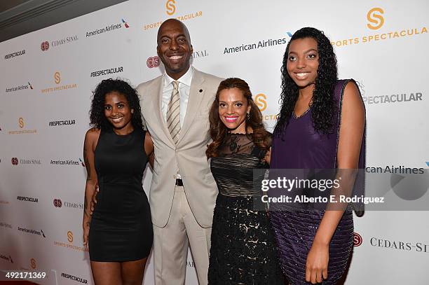 Tyla Salley, Natasha Duffy, former professional basketball player and radio host John Salley and guest arrive on the red carpet at the 2014 Sports...