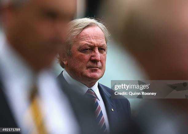 Kevin Sheedy walks around the boundary to form a guard of honour during the public service for Tom Hafey at Melbourne Cricket Ground on May 19, 2014...