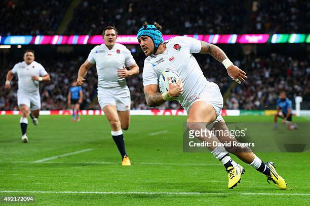 Jack Nowell of England scores his first try during the 2015 Rugby World Cup Pool A match between England and Uruguay at Manchester City Stadium on...