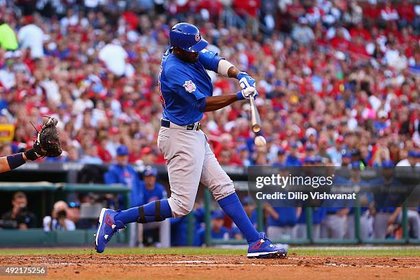 Dexter Fowler of the Chicago Cubs hits an RBI single in the second inning against the St. Louis Cardinals during game two of the National League...