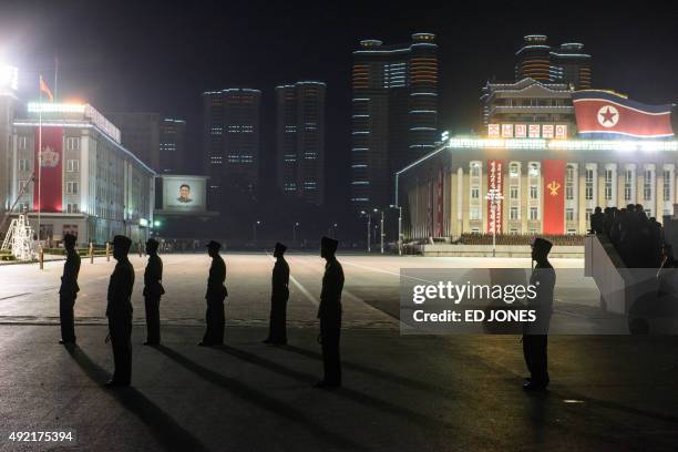North Korean soldiers stand on Kim Il-Sung square in Pyongyang on October 10, 2015. North Korea was marking the 70th anniversary of its ruling...