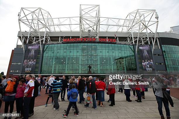 General view of fans arriving at Old Trafford Stadium prior to the First Utility Super League Grand Final between Leeds Rhinos and Wigan Warriors at...
