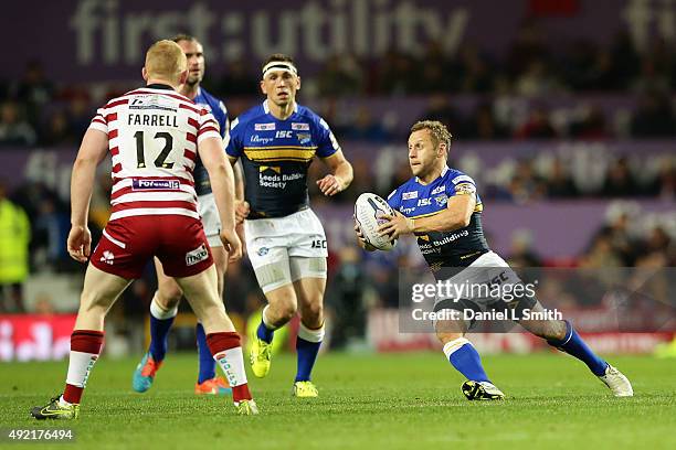 Carl Ablett of Leeds Rhinos shoves George Williams of Wigan Warriors during the First Utility Super League Grand Final between Leeds Rhinos and Wigan...