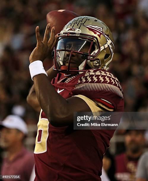 Everett Golson of the Florida State Seminoles warms up during a game against the Miami Hurricanes at Doak Campbell Stadium on October 10, 2015 in...