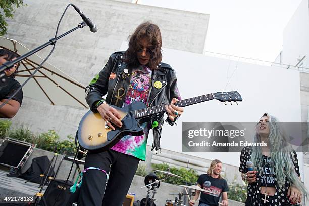 Guitarist Zach James and singer Alexandra Starlight of Alexandra & The Starlight Band perform onstage as part of the Venice Art Walk and Auctions at...