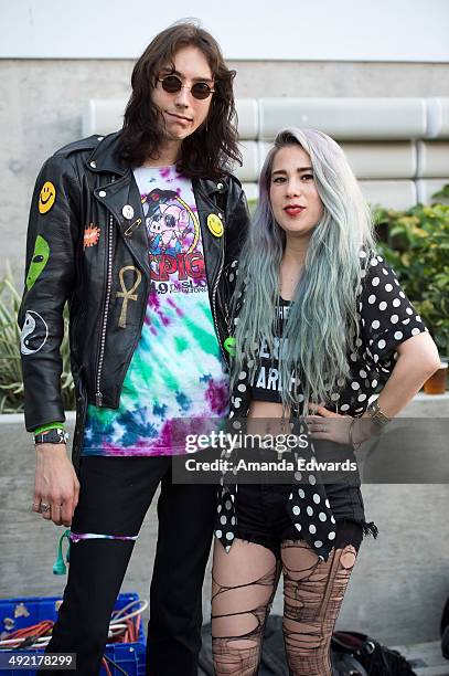 Guitarist Zach James and singer Alexandra Starlight of Alexandra & The Starlight Band pose after performing onstage as part of the Venice Art Walk...