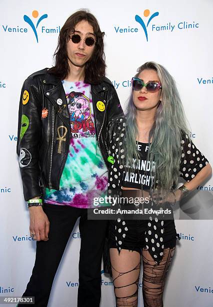 Guitarist Zach James and singer Alexandra Starlight of Alexandra & The Starlight Band pose after performing onstage as part of the Venice Art Walk...