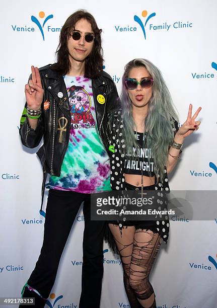 Guitarist Zach James and singer Alexandra Starlight of Alexandra & The Starlight Band pose after performing onstage as part of the Venice Art Walk...