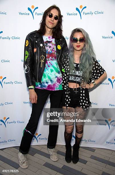 Guitarist Zach James and singer Alexandra Starlight of Alexandra & The Starlight Band pose after performing onstage as part of the Venice Art Walk...