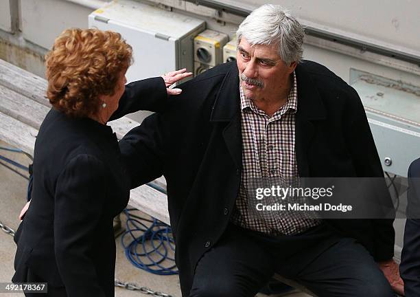 Former Tigers players Brian Roberts and Maureen Hafey, the wife of Tommy Hafey, greet each other after the guard of honour during the public service...