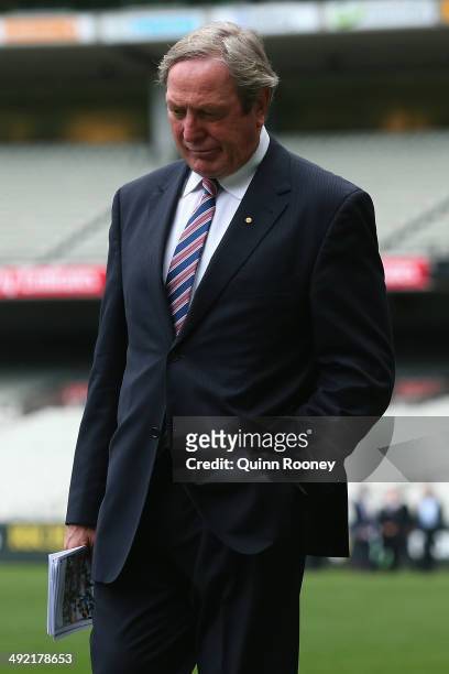 Kevin Sheedy walks around the boundary to form a guard of honour during the public service for Tom Hafey at Melbourne Cricket Ground on May 19, 2014...